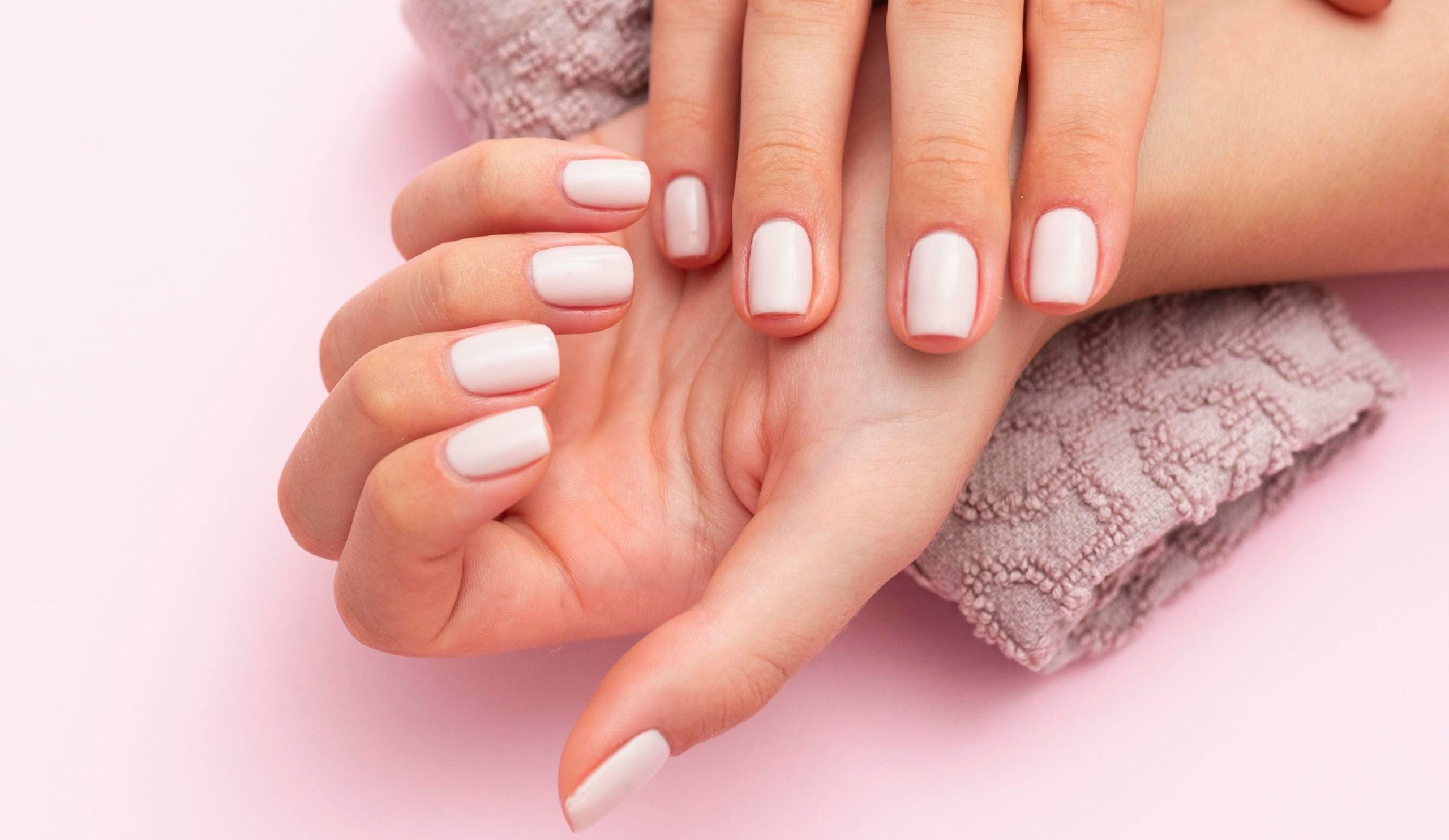 woman-showing-her-beautiful-nails